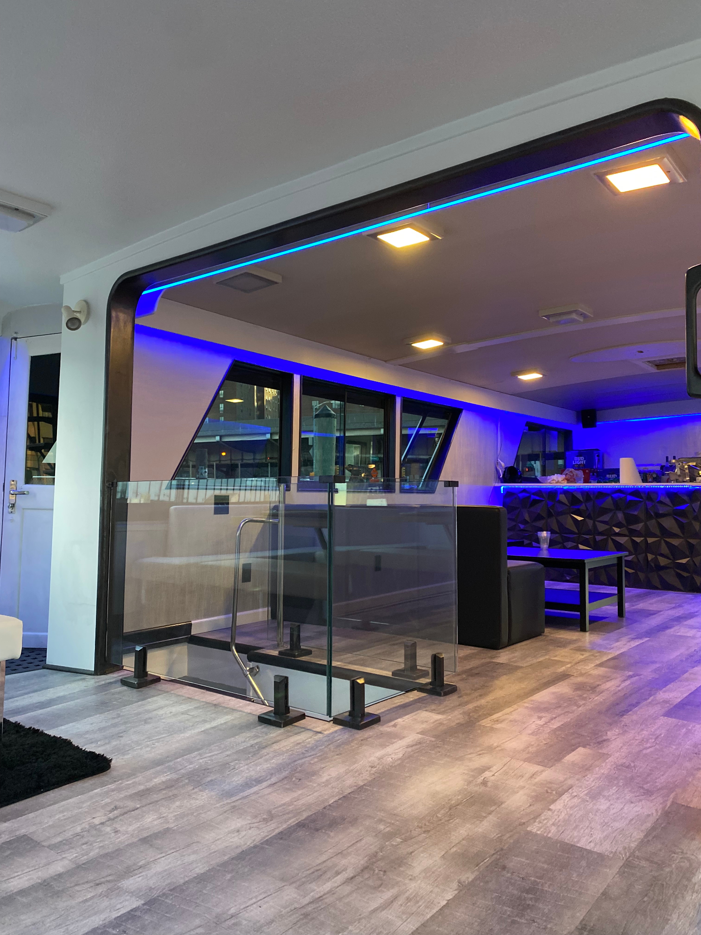 Unity main deck bar area with blue accent lighting