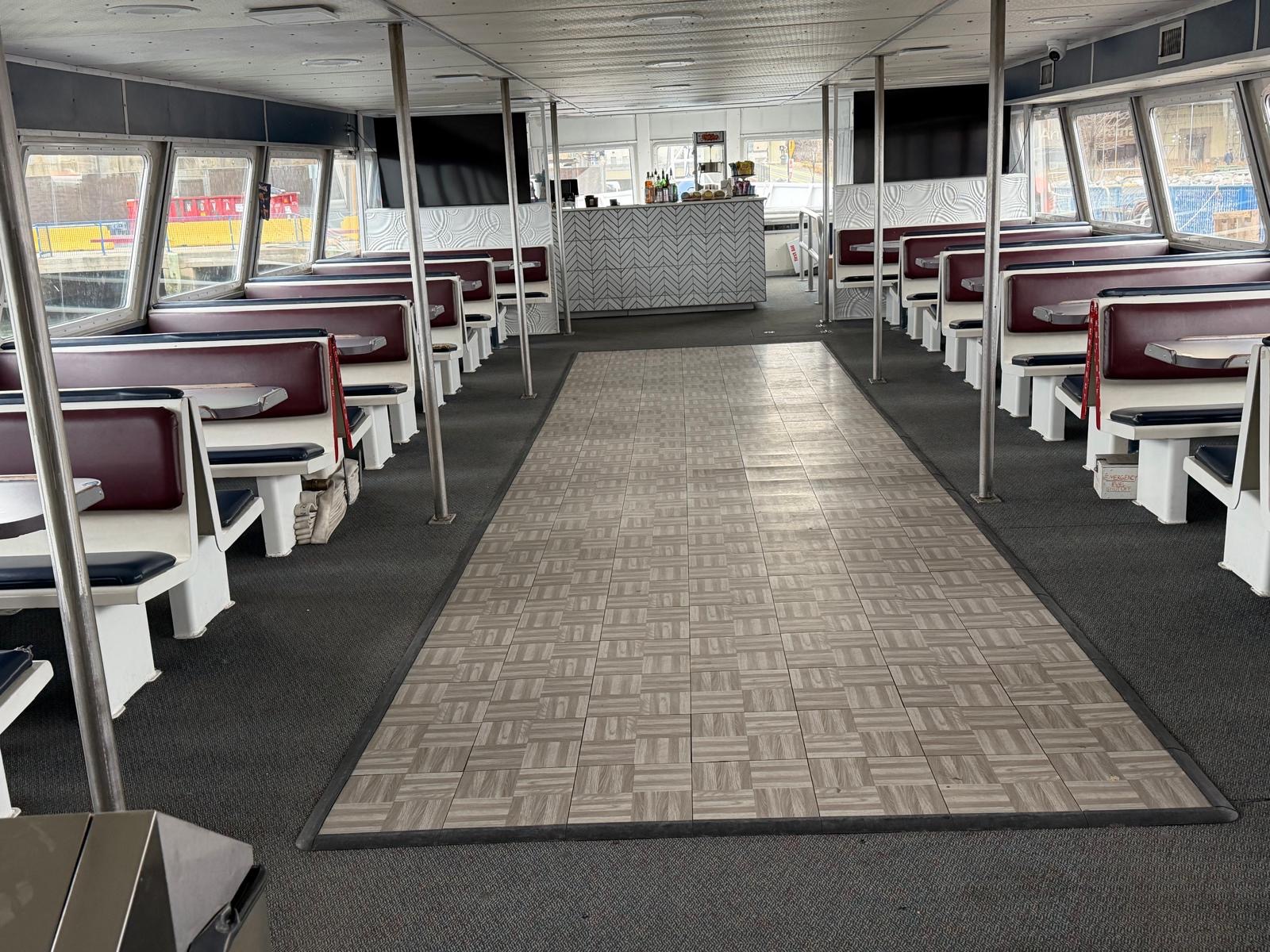 Guests celebrating on a private party yacht in NYC