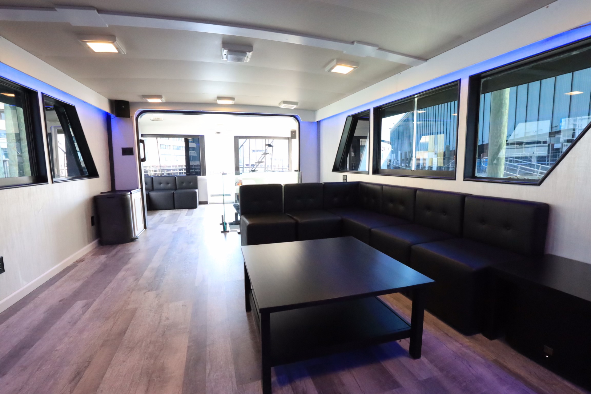 Unity entertainment lounge with black leather sectional