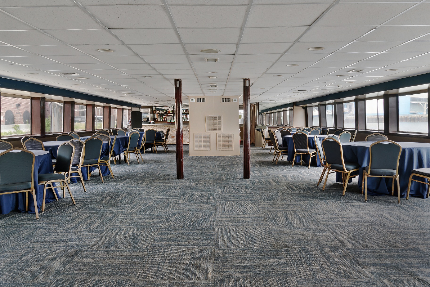 Star of the Hudson first floor event space with dining tables